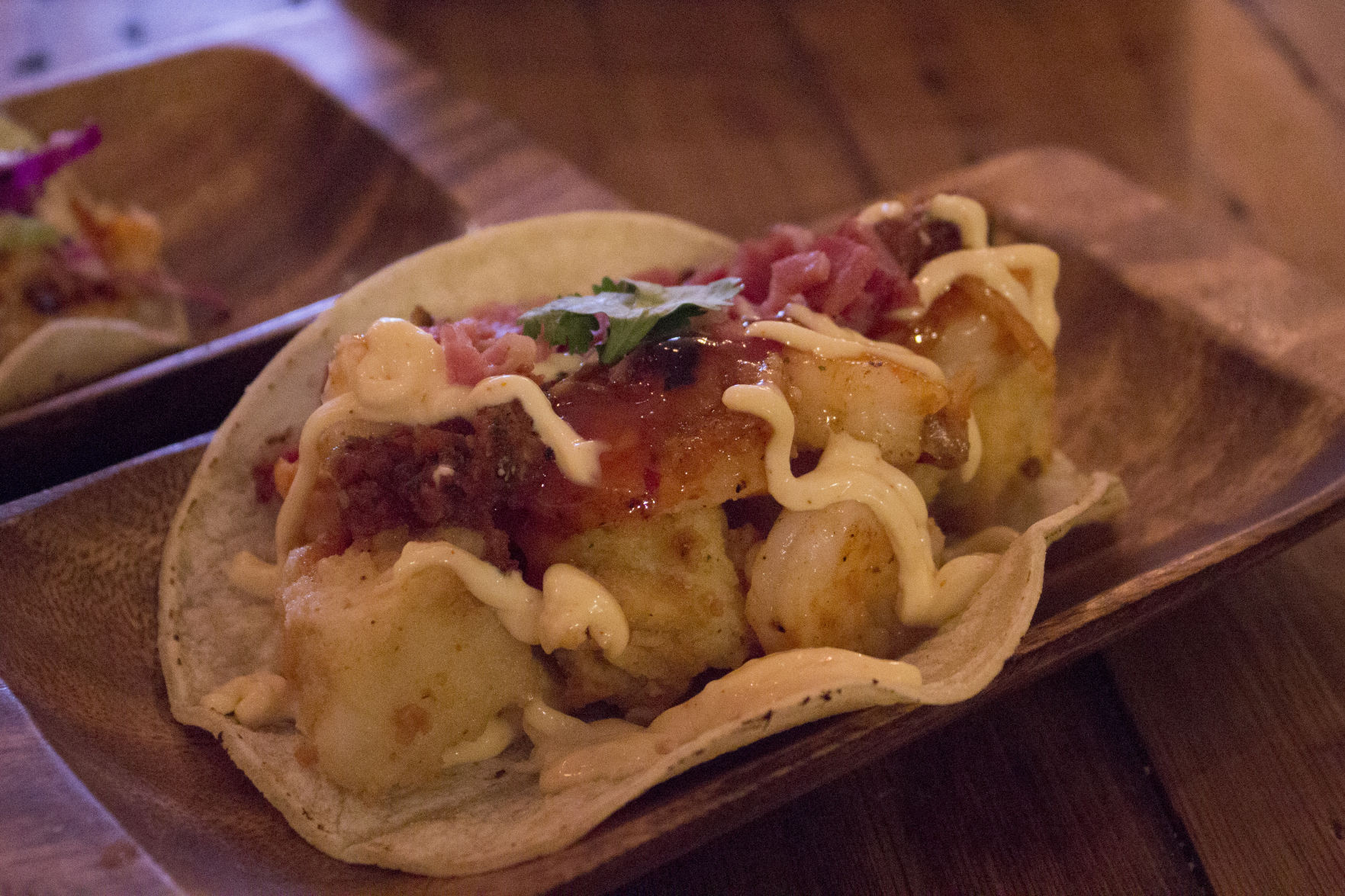 Eat shrimp and grits taco